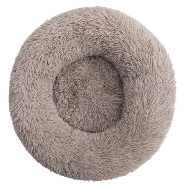 Deeply comforting plush dog bed, calming pet lounger for anxiety relief and restful sleep.