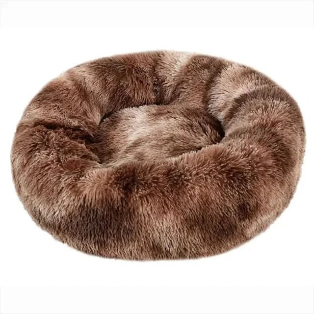 Plush calming pet bed, a super soft lounger providing anxiety relief for dogs and cats.