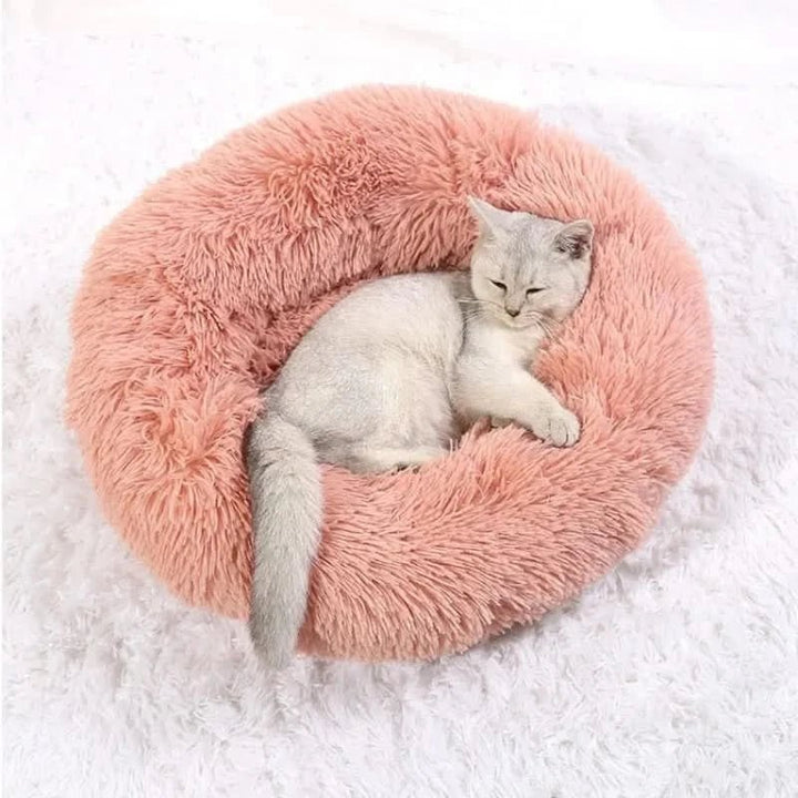 Anxiety-relief calming dog bed, cozy plush lounger for deep relaxation and peaceful sleep.