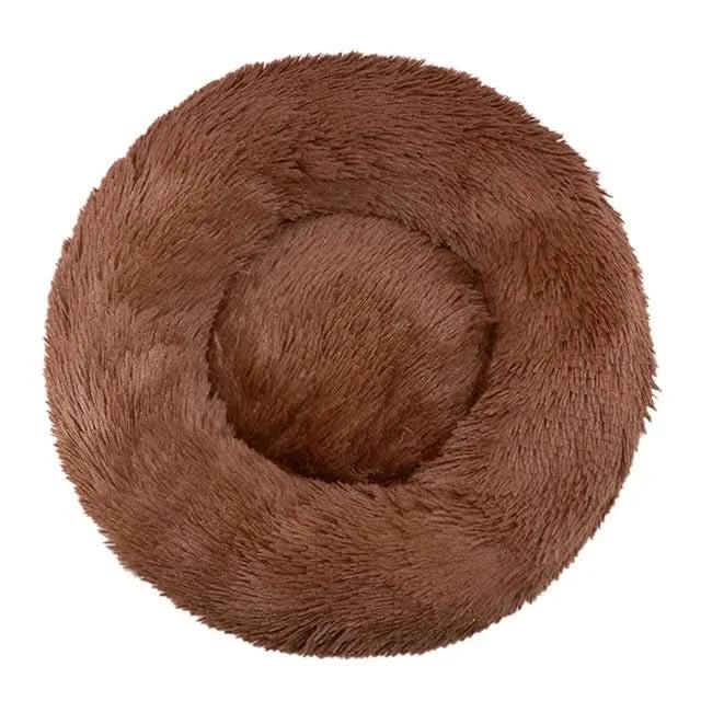 Comfortable calming dog bed, deep plush pet lounger for stress reduction and peaceful rest.