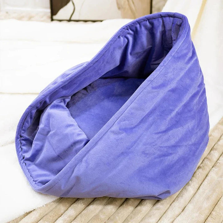 Comfortable cat accessories: an egg tart shaped plush pet bed, providing warmth and softness.