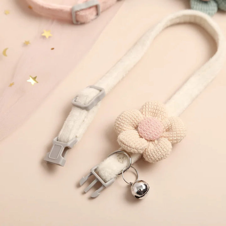 Stylish cat collar featuring a vibrant floral pattern and adjustable buckle