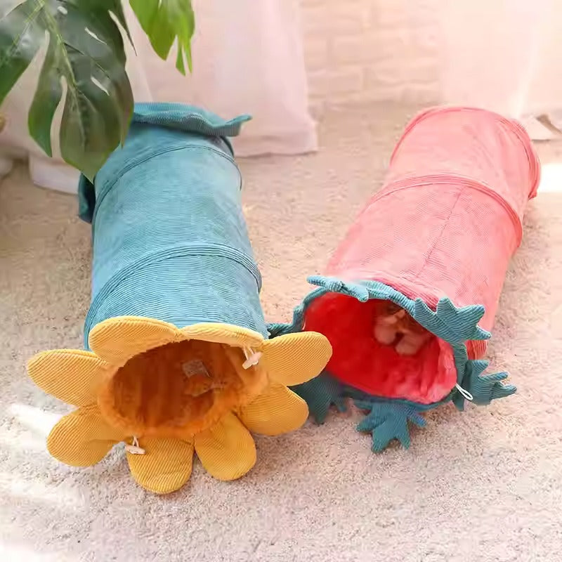 Brightly colored cat play tunnel, designed as a large flower, offering a comfortable cat bed.