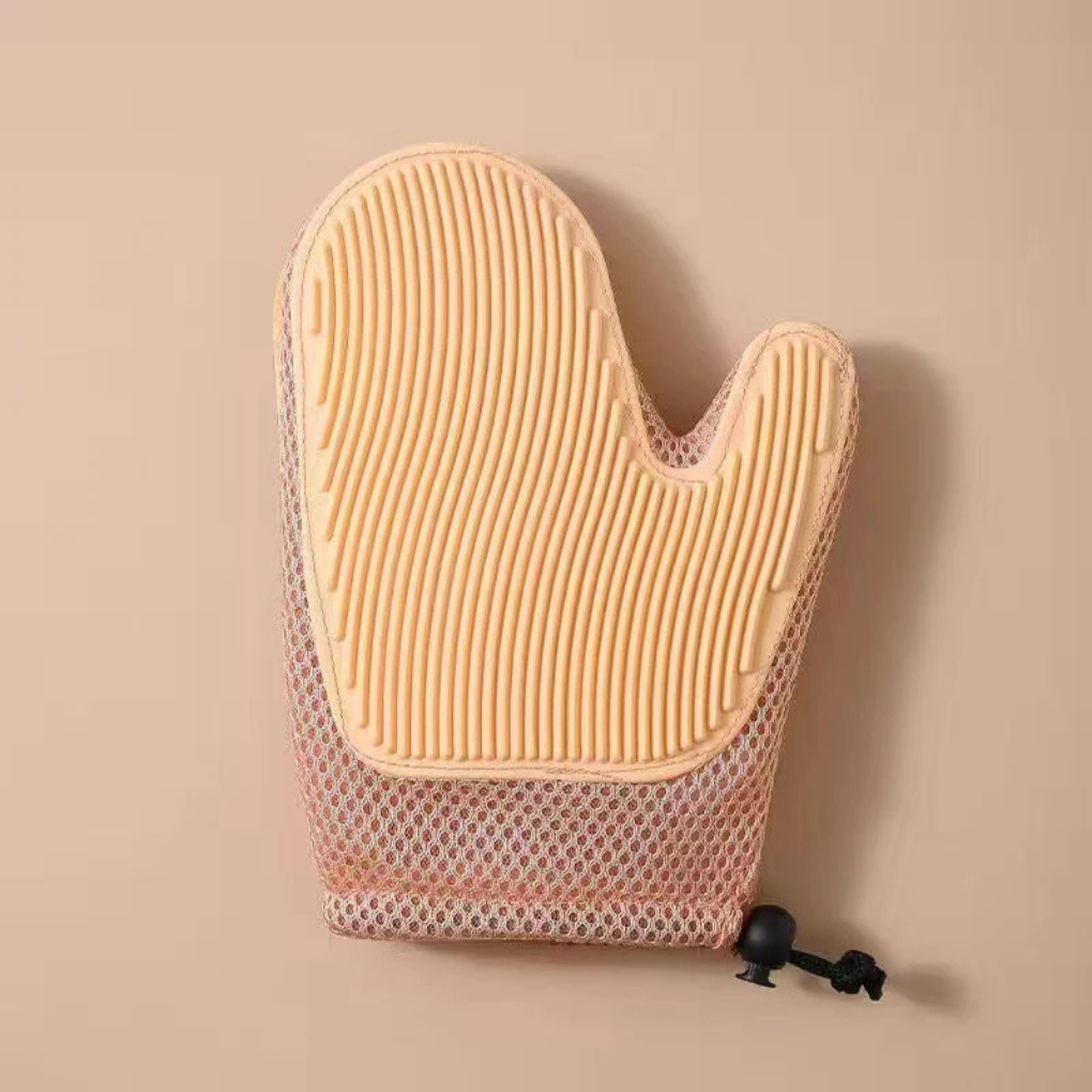 Close-up of silicone nubs on a cat grooming massage glove, effective pet brush for shedding & massage