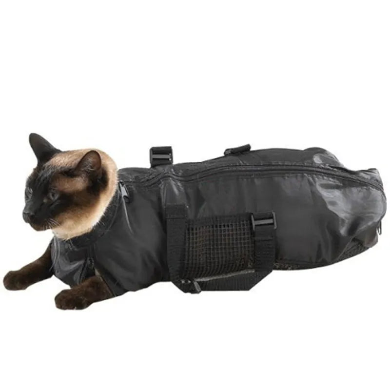 Feline accessory: a breathable grooming restraint bag, aiding in calm claw trimming procedures.