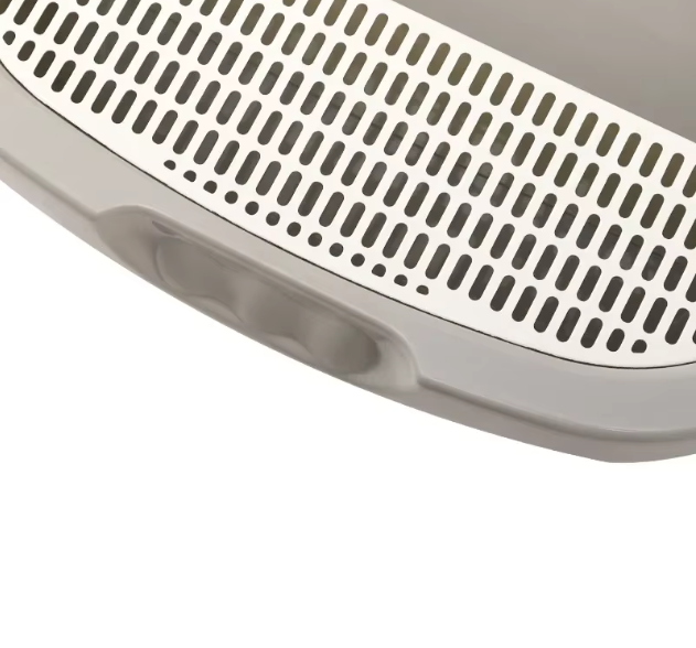 Two cat litter trays with high rims, stacked for storage, showing space-saving design