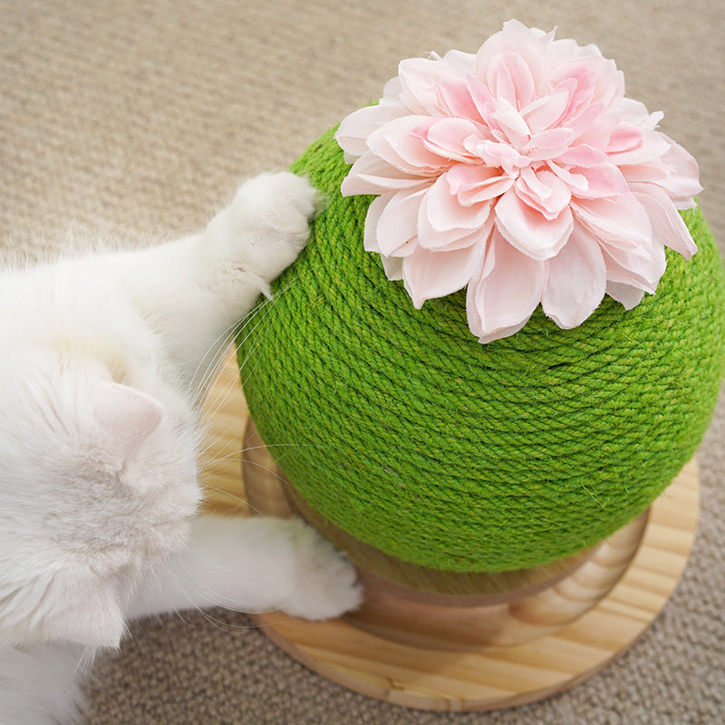 Green cactus-shaped cat scratcher with sisal rope and dangling plush ball for play.