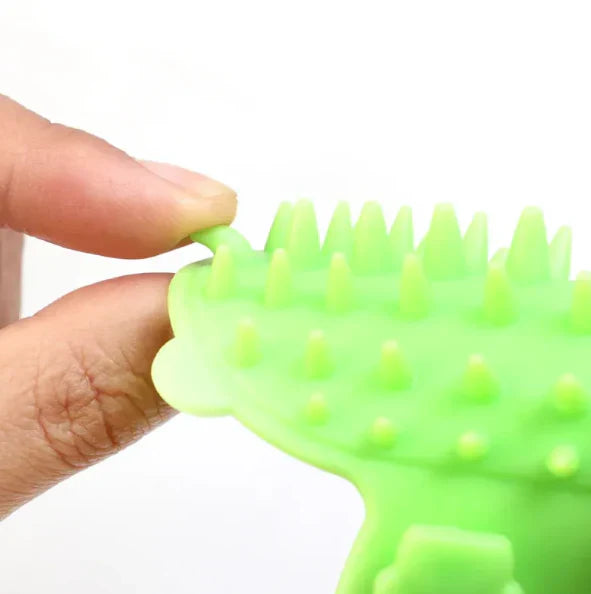 Product shot of a cat self-grooming corner scrubber with mounting adhesive for itch relief