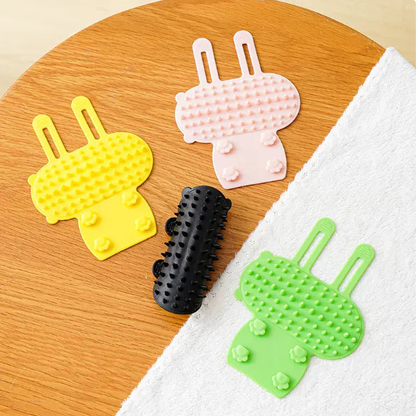 Close-up of silicone brush on cat corner scrubber, ideal for feline grooming & pet care