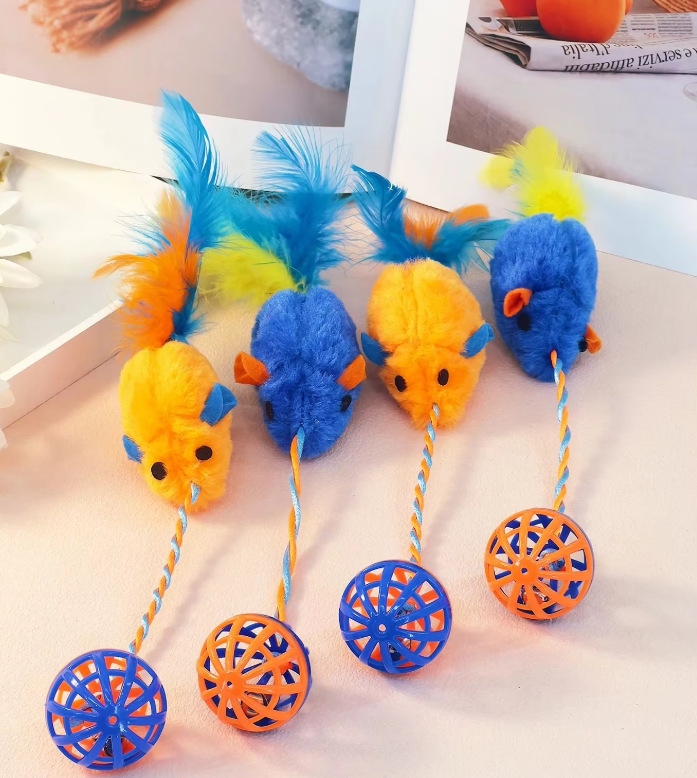 Assorted plush cat toys including mice and feather balls, enriching active play