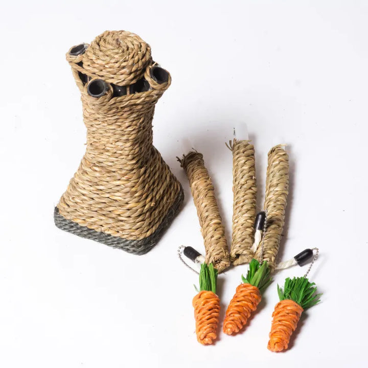 Close-up of cat tree scratching post showing sisal texture & one plush carrot toy for cats.
