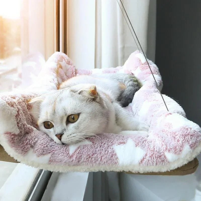 Grey cat window perch providing a cozy, elevated pet lounging spot with strong suction cups