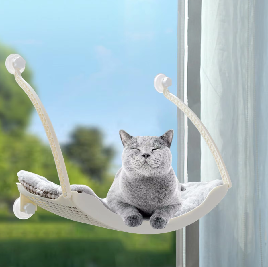 Cat accessory: Window Hammock with industrial strength suction cups, providing a safe elevated perch