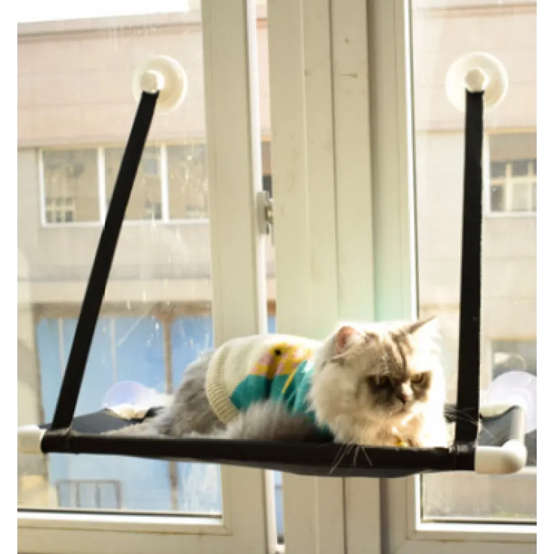 Durable cat bed window lounger, perfect for cats to observe surroundings, featuring a sturdy design and suction mounts.