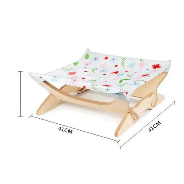 Cat wooden lounger with colorful striped cover, a soft and inviting pet bed.
