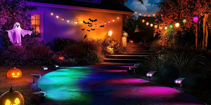 Tavvitaimp18 RGB solar garden spotlights casting colorful hues on plants, vibrant landscape lighting.