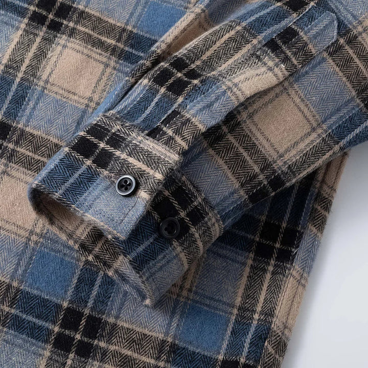 Stylish men's plaid flannel shirt, perfect for effortless casual style and layering in cool weather.