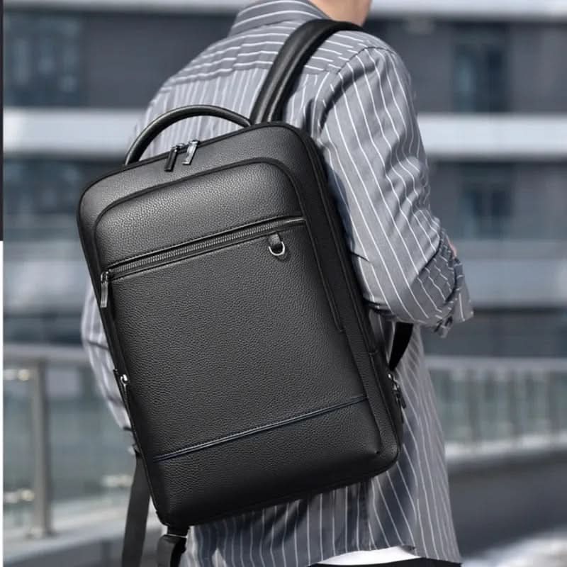 Everyday carry unisex backpack, designed with USB charging & secure laptop storage for commutes.