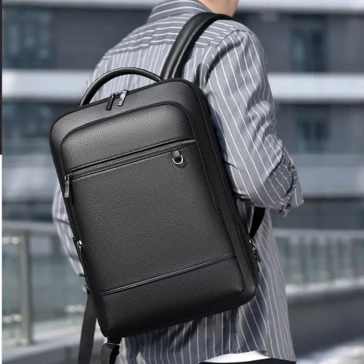 Everyday carry unisex backpack, designed with USB charging & secure laptop storage for commutes.