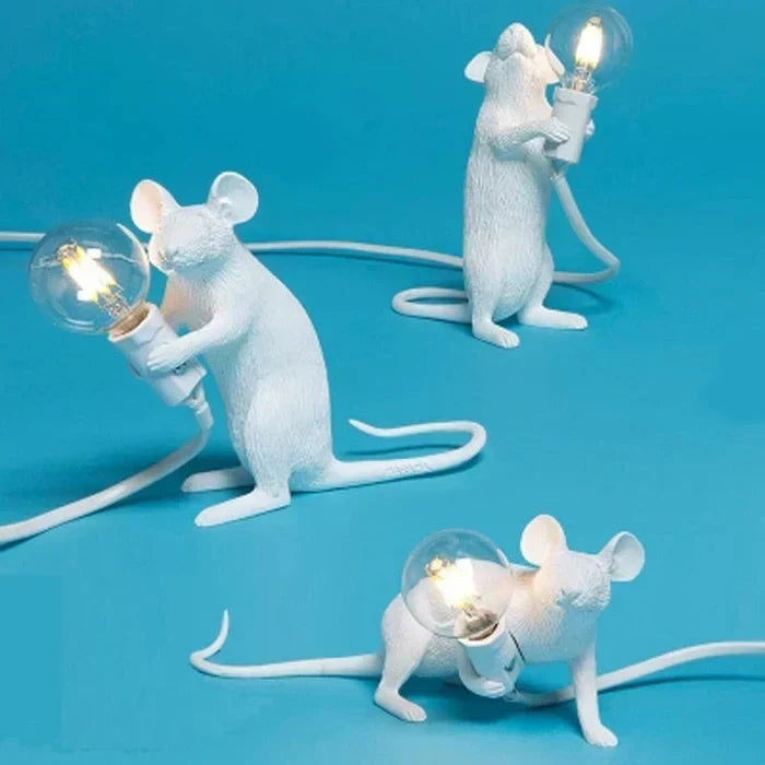 Playful gold mouse desk lamp, unique white table light for animal-themed home decor.