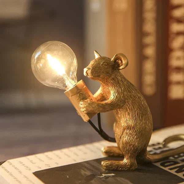 Decorative gold mouse desk lamp, white shade, playful animal lighting for home decor.