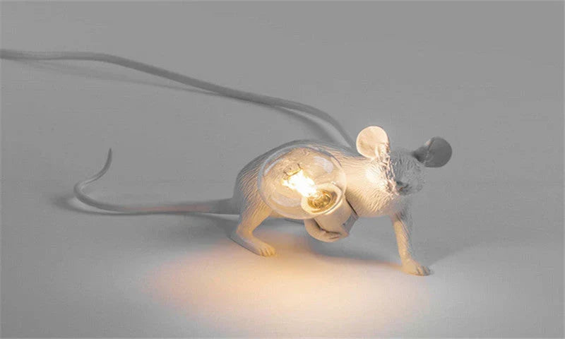 Decorative gold mouse lamp, playful and unique desk light for any home interior.