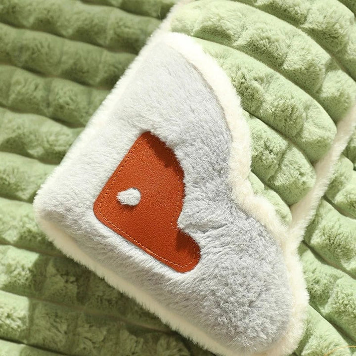 Cozy checkered dog bed with raised edges, suitable for small to medium dogs.