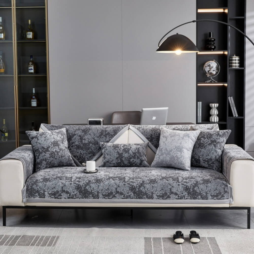 Living room scene with a dog on a chenille anti-scratch couch cover, pet friendly home decor