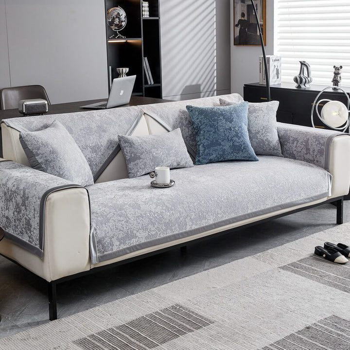 Chenille anti-scratch sofa protector cover in a modern home decor setting, stylish