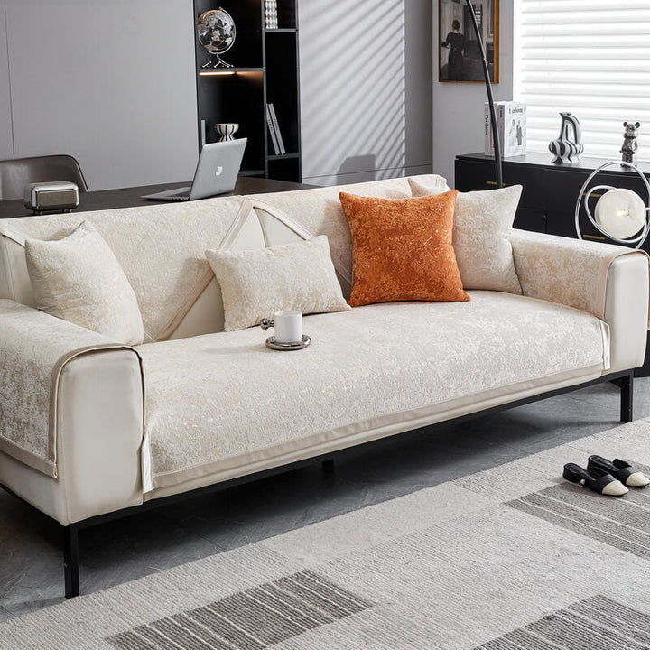 Demonstration of the non-slip feature of chenille anti-scratch couch cover, secure fit