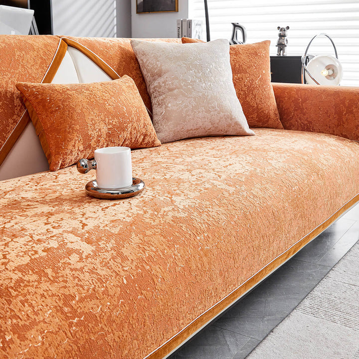Detailed shot of chenille couch cover's non-slip backing for secure furniture protection
