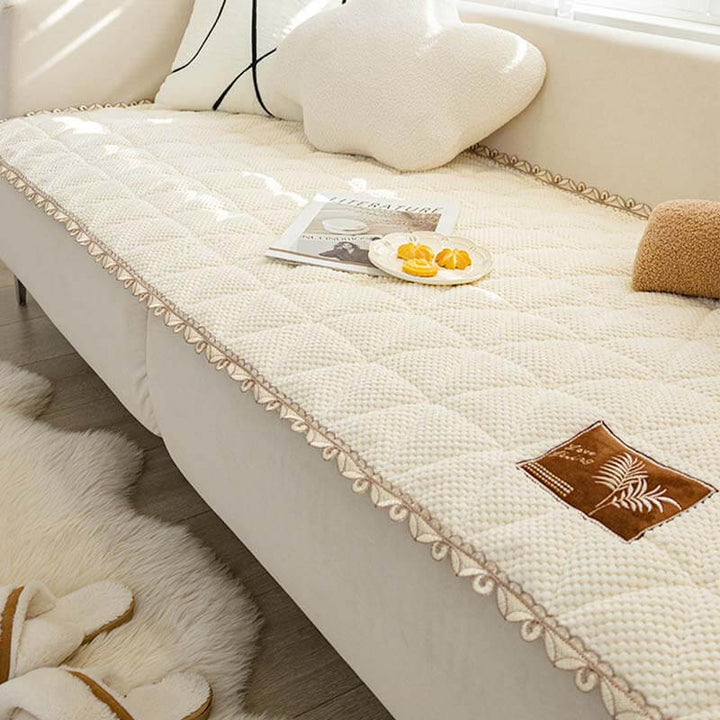Chenille bread shape non-slip sofa cover protects living room couch, pet friendly.