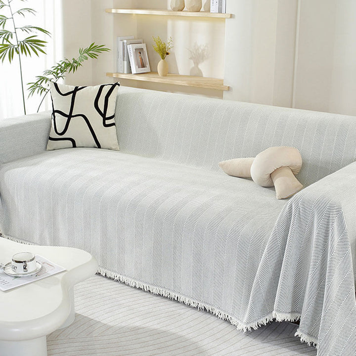 Textured chenille throw blanket in herringbone pattern, perfect as a decorative couch cover