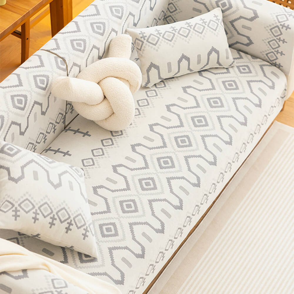 Breathable chenille fabric sectional couch cover, a soft sofa protector for pet-friendly living spaces.