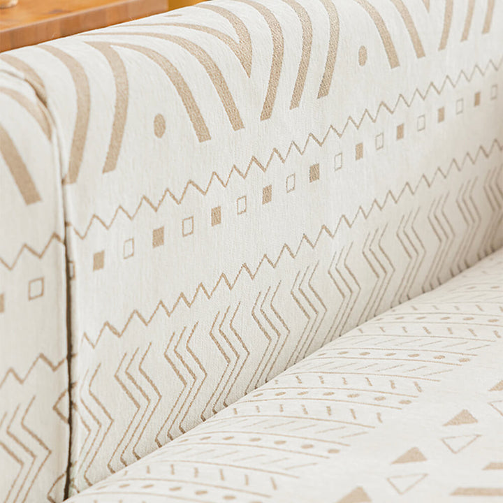 Luxurious chenille fabric couch cover on a sectional sofa, enhancing home decor with a breathable design.