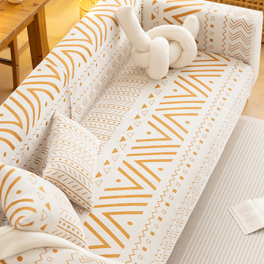 Warm-toned chenille sectional couch cover, offering breathable comfort and pet-friendly furniture protection.