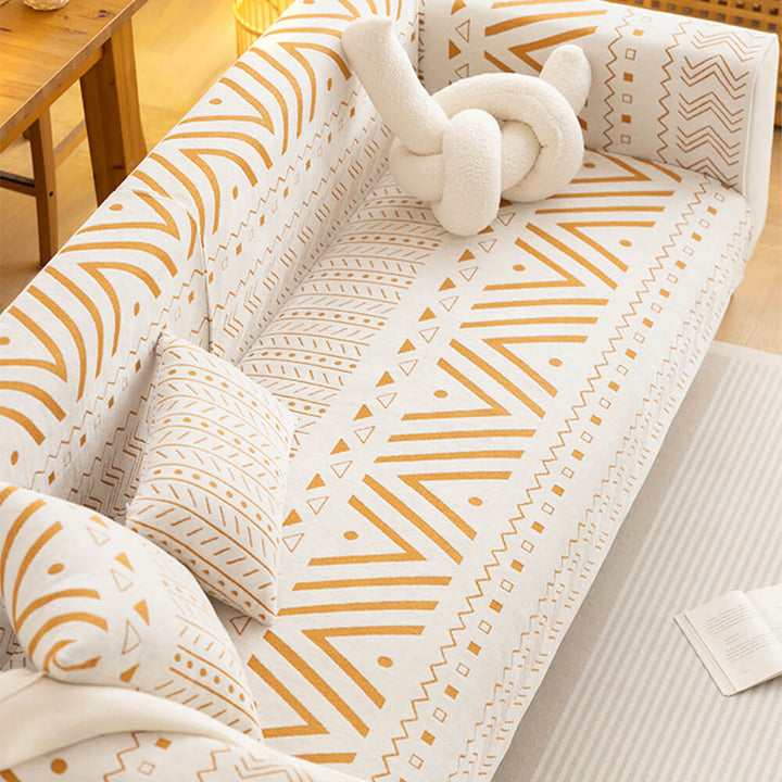 Warm-toned chenille sectional couch cover, offering breathable comfort and pet-friendly furniture protection.