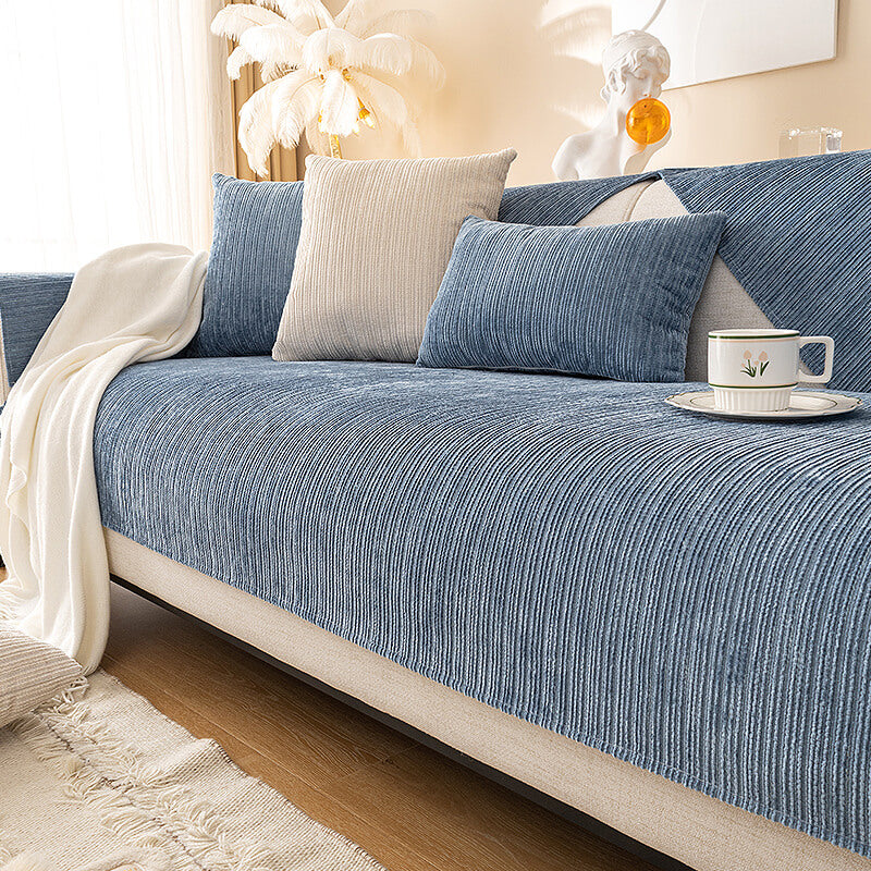 Pet-friendly sofa cover made of durable chenille, styled for modern home decor