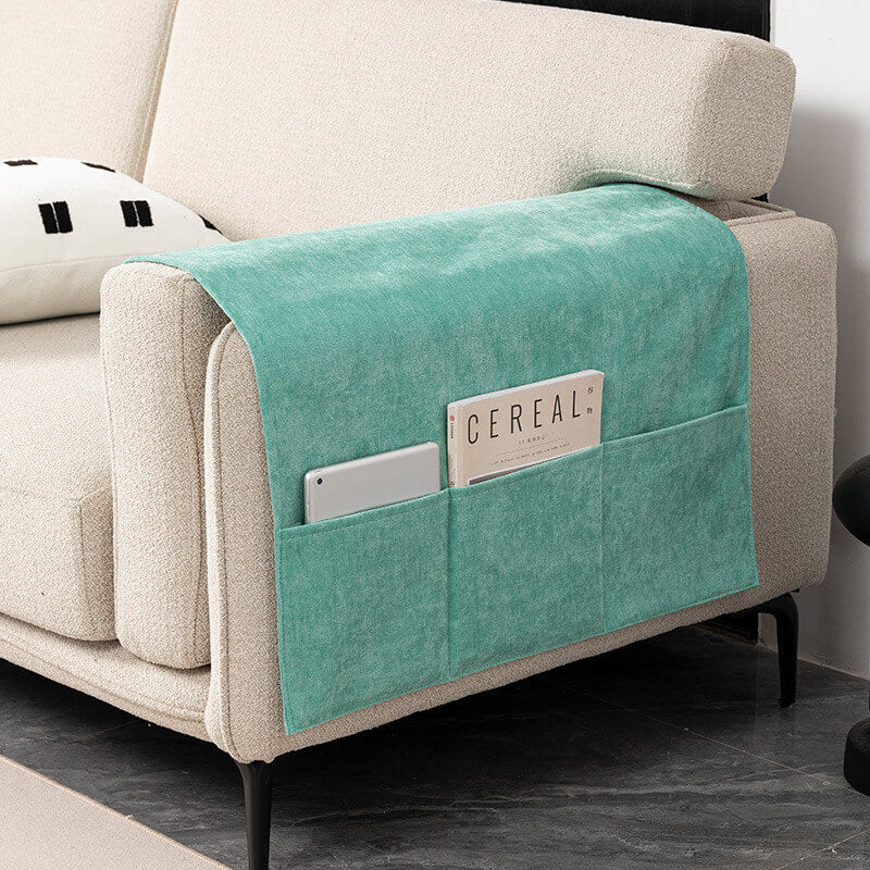 Brown chenille sofa armrest cover with storage pockets, providing practical furniture protection