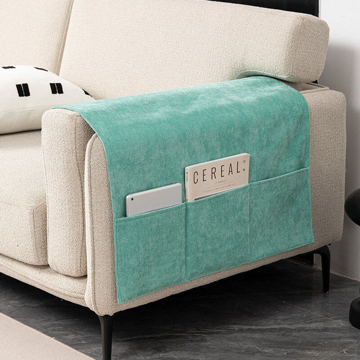 Brown chenille sofa armrest cover with storage pockets, providing practical furniture protection