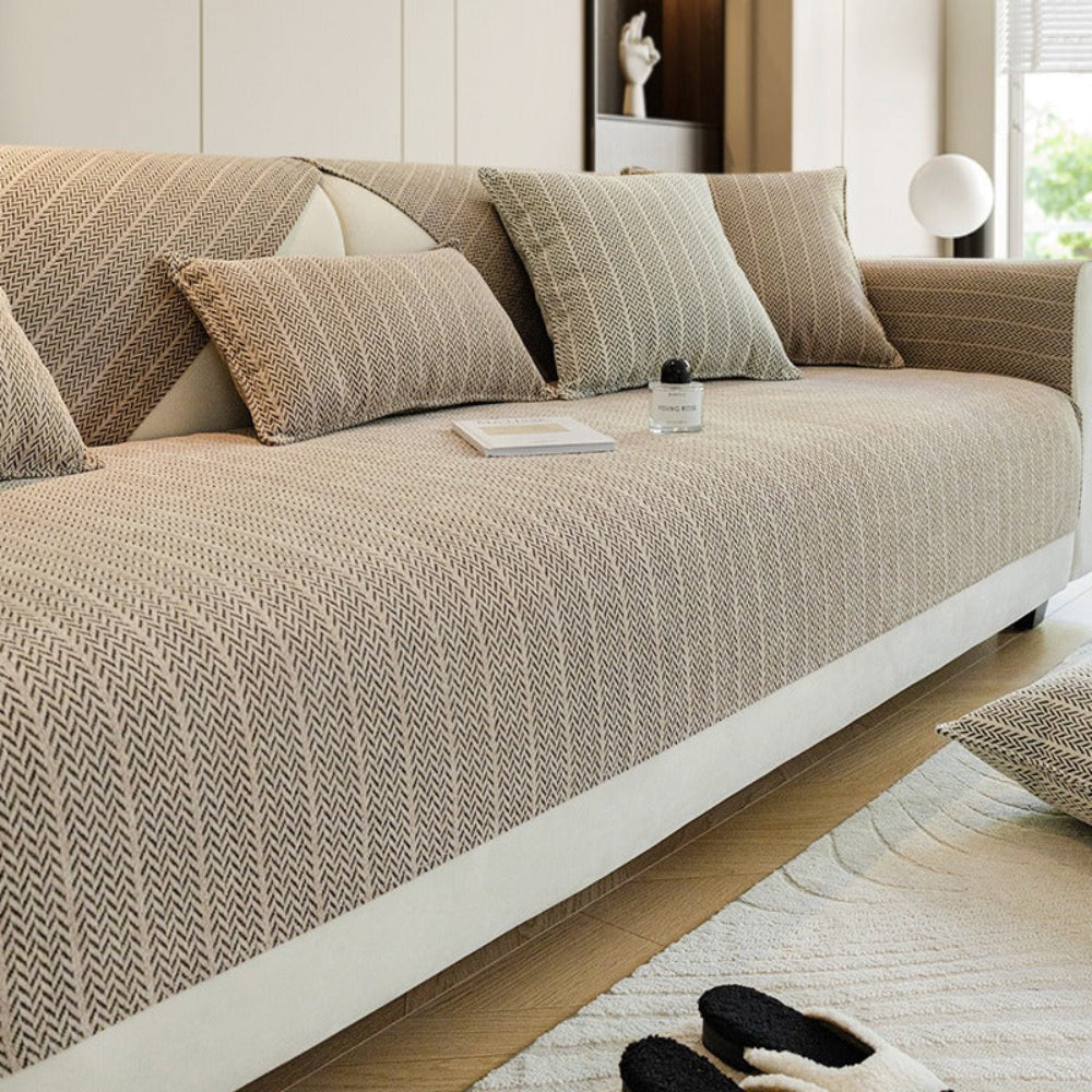 Close-up of a textured chenille sofa cover highlighting its soft feel and scratch-resistant fabric