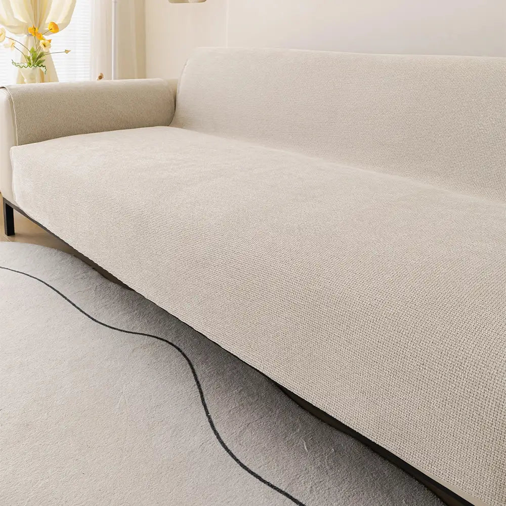Detail of chenille fabric on a scratch-resistant sofa cover, showcasing its durable texture.