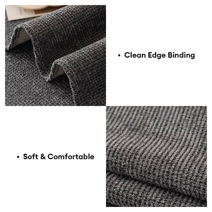 Close-up of the non-slip backing on a durable chenille sofa protector, ensuring it stays in place.
