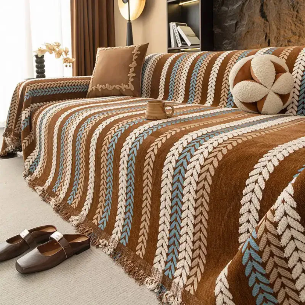New4 sofa throw cover in soft chenille, displaying a stylish leaf pattern for home decor.