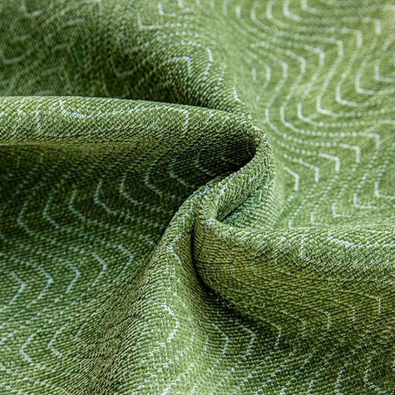 Anti-scratch chenille sectional cover in a living room, enhancing home decor & durability