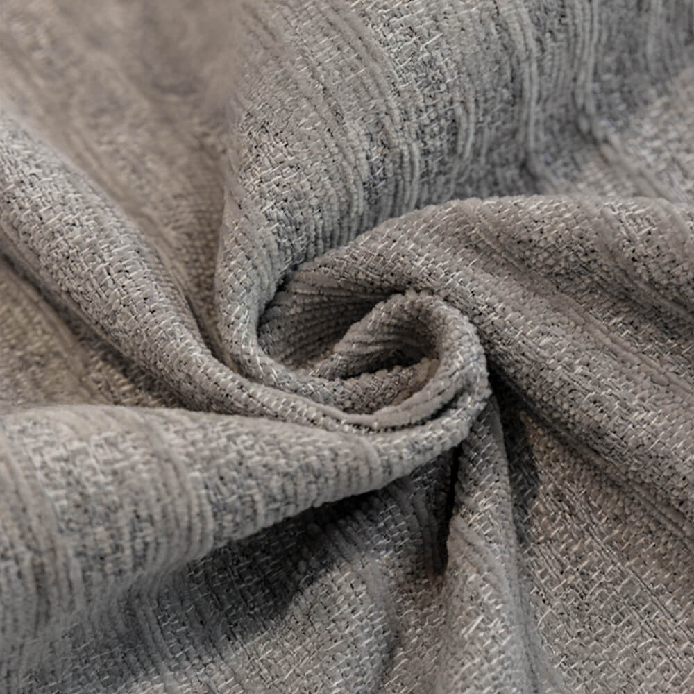 Pet-friendly anti-scratch chenille couch cover draped over a sofa, protecting furniture.