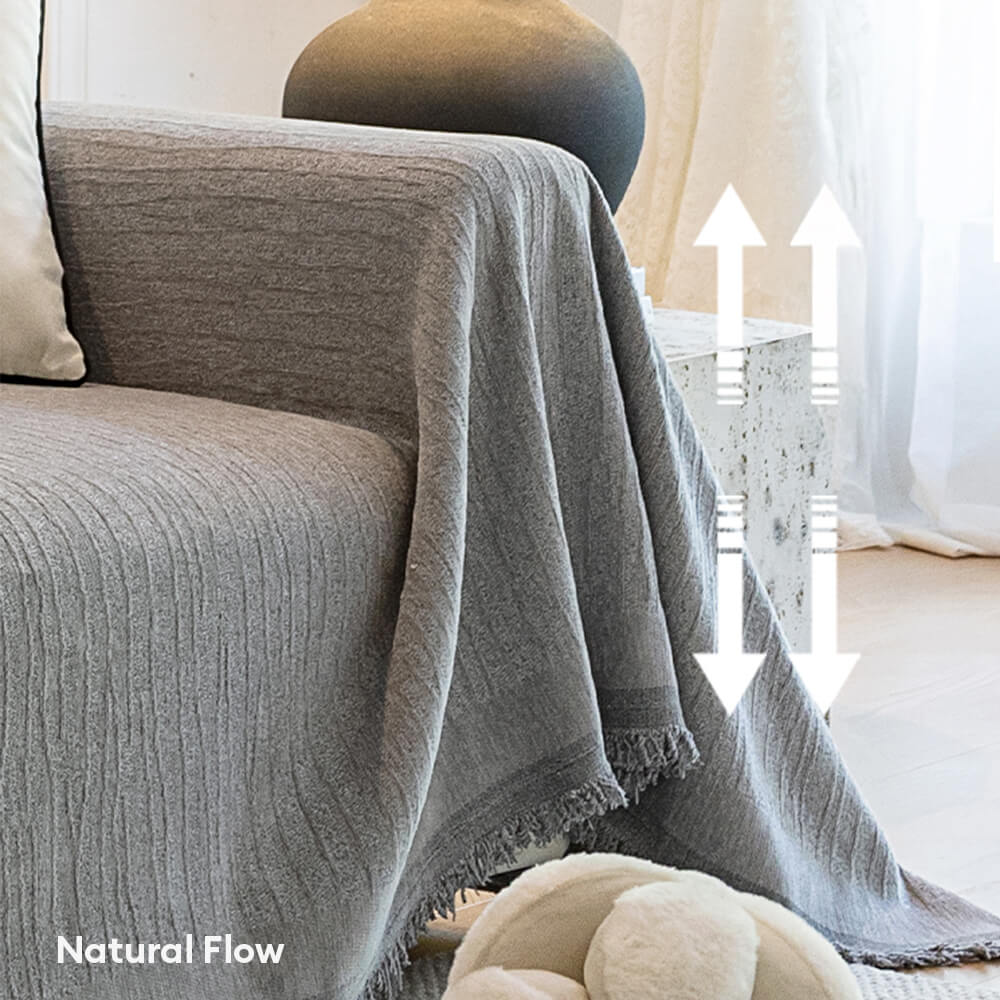 Detailed shot of the durable, woven chenille texture of the pet-friendly anti-scratch couch cover.