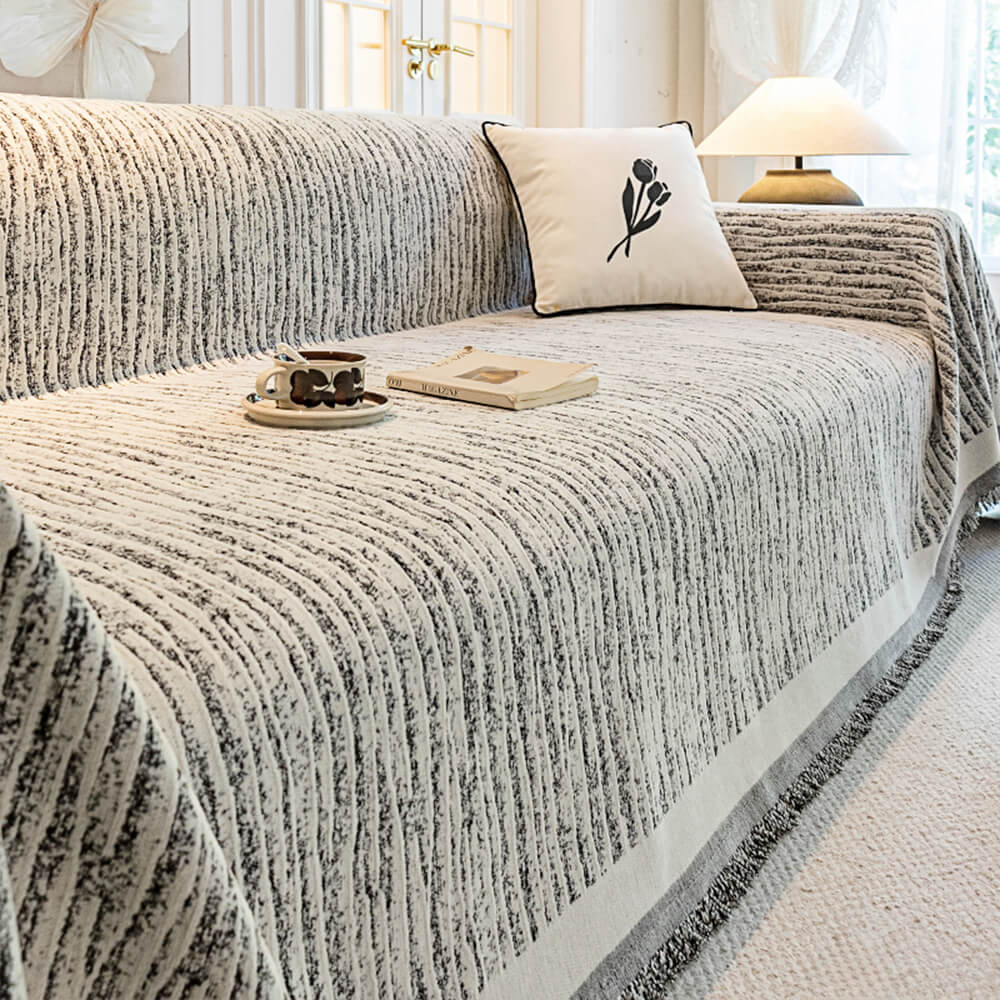 Elegant chenille sofa throw cover, providing anti-scratch protection for homes with pets.
