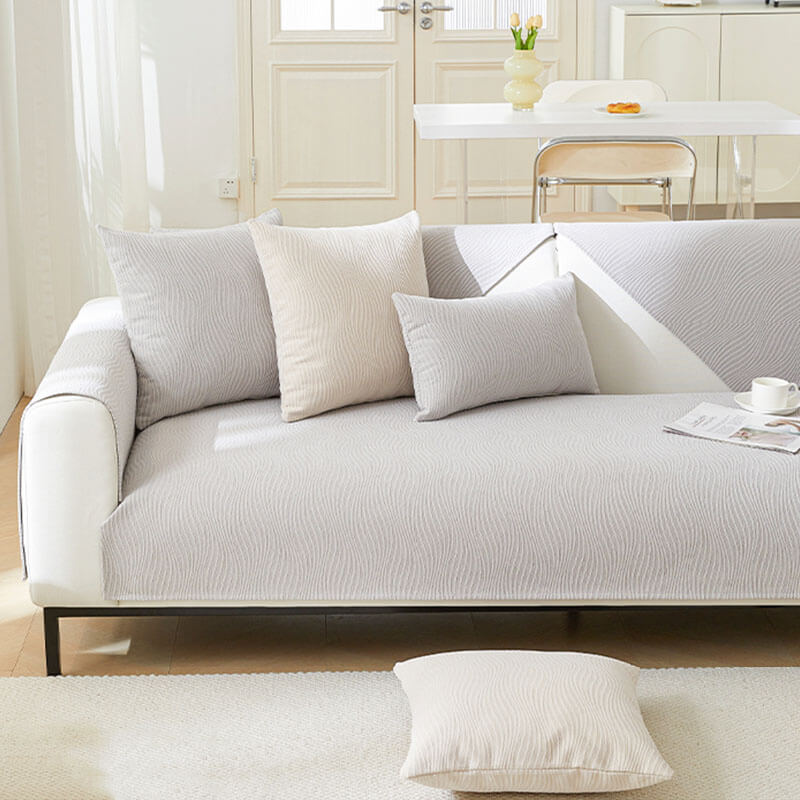 Textured chenille sofa cover with realistic wood grain, a durable non-slip furniture protector