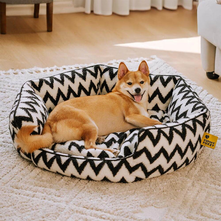 Large washable dog bed with a modern chevron design, ultimate comfort.